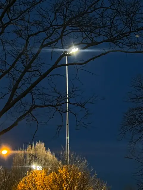 Night's silent glow, piercing the dark.